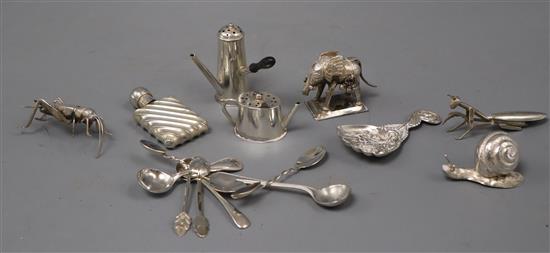 A Victorian silver caddy spoon, a similar silver miniature chocolate pot pepperette and teapot and twelve other items.